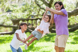 Mom playing with daughters